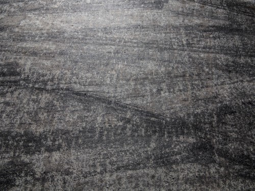 Black Grunge Rubber Tire On Tarmac